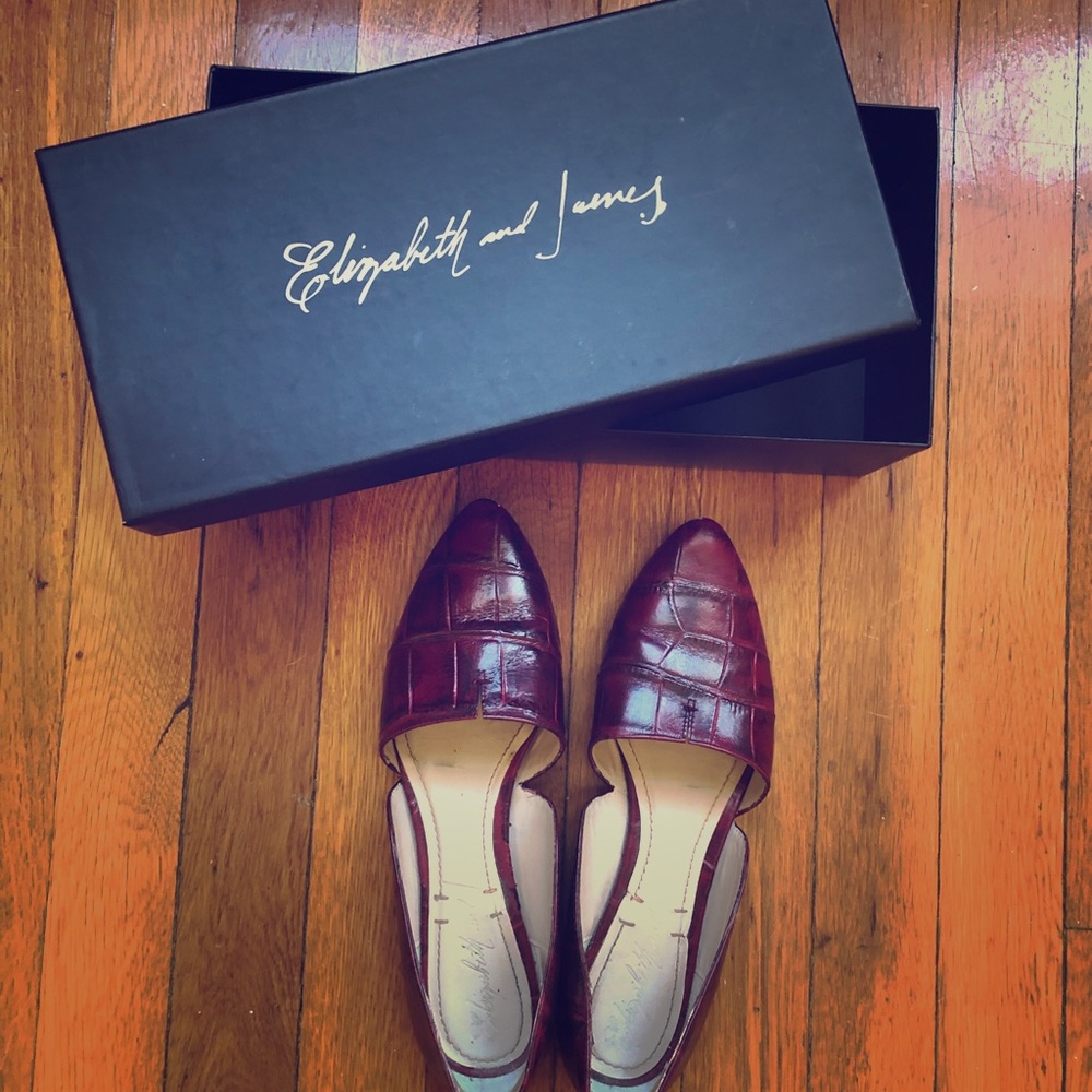 Elizabeth and James burgundy snakeskin flats.